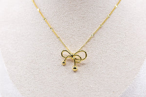 Gold Floating Bow Necklace